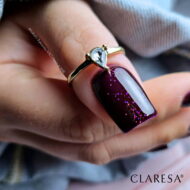 fioletowy-lakier-hybrydowy-z-brokatem